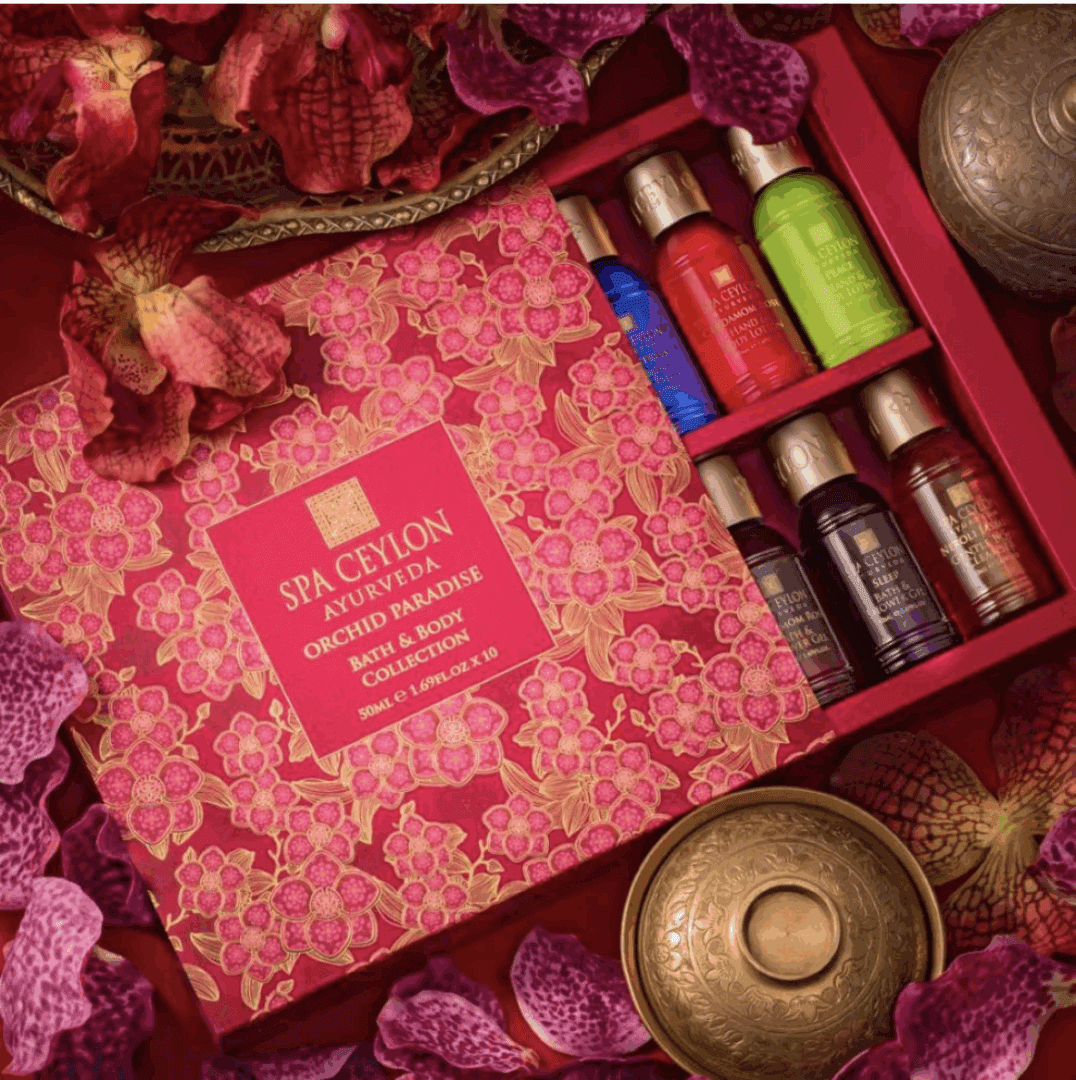 Luxurious spa gift set with essential oils and bath salts in a decorative box.