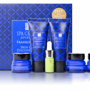 A set of skincare products including cream, serum, and cleanser in blue and green packaging.