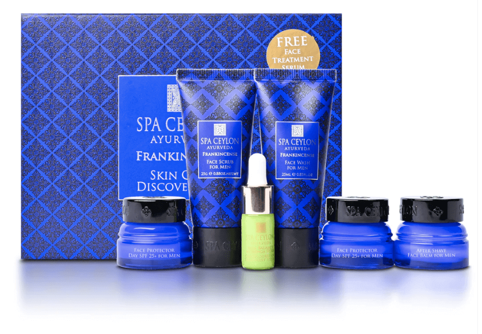 A set of skincare products including cream, serum, and cleanser in blue and green packaging.