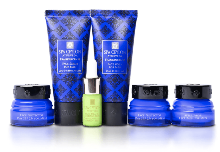 A collection of blue skincare products in various containers.