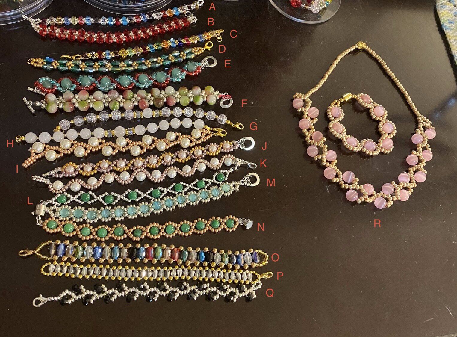 Colorful beaded bracelets array with pink floral set